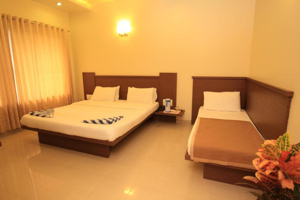 Hotel Sai Smaran Shirdi Oda fotoğraf